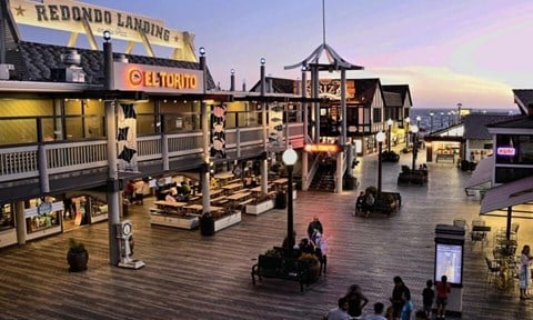 a view of the boardwalk at dusk